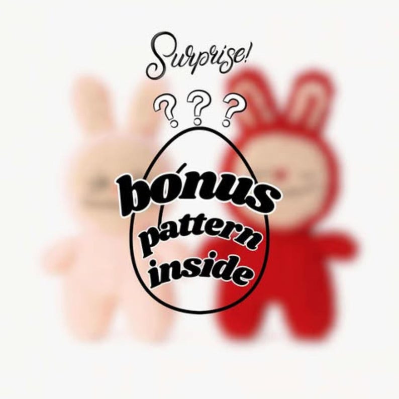 May include: An image with a light pink and red bunny-shaped plush toy. The text "Surprise!" is above a black egg shape with the text "bonus pattern inside". Two question marks are above the egg.