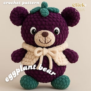 May include: A handmade crochet eggplant bear in shades of purple, green, and cream. The bear has a smiling face, a cream-colored scarf with a bow, and the text "eggplant bear". The image also includes the text "crochet pattern" and "Click+Stitch".