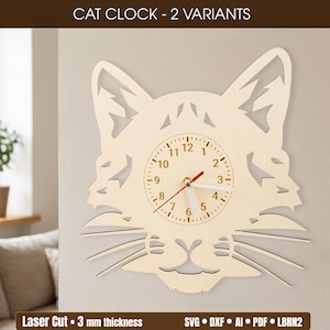 May include: A wooden cat-shaped wall clock with a light-colored finish. The clock face features black numbers and hands, with a red second hand. The text "CAT CLOCK - 2 VARIANTS" is at the top. The clock is laser cut with a 3 mm thickness.