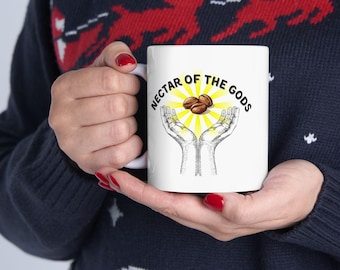 Taza de cerámica "Néctar de los Dioses": Manos y granos de café