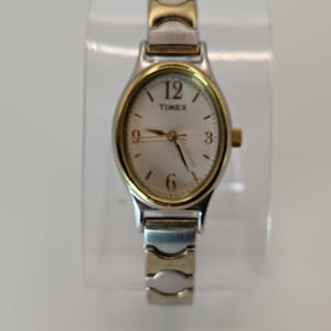 Vintage Timex ovaal tweekleurig quartzhorloge roestvrij staal, volledig gerestaureerd, nieuwe batterij