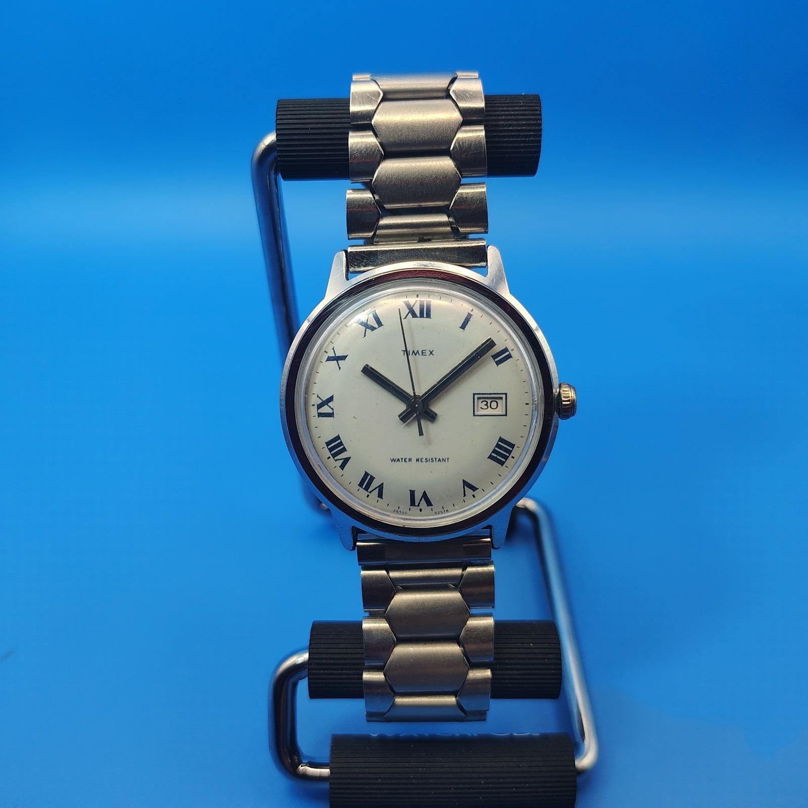 Vintage 1976 Timex Date Mechanical Wind 35mm Mens Watch  display picture 1