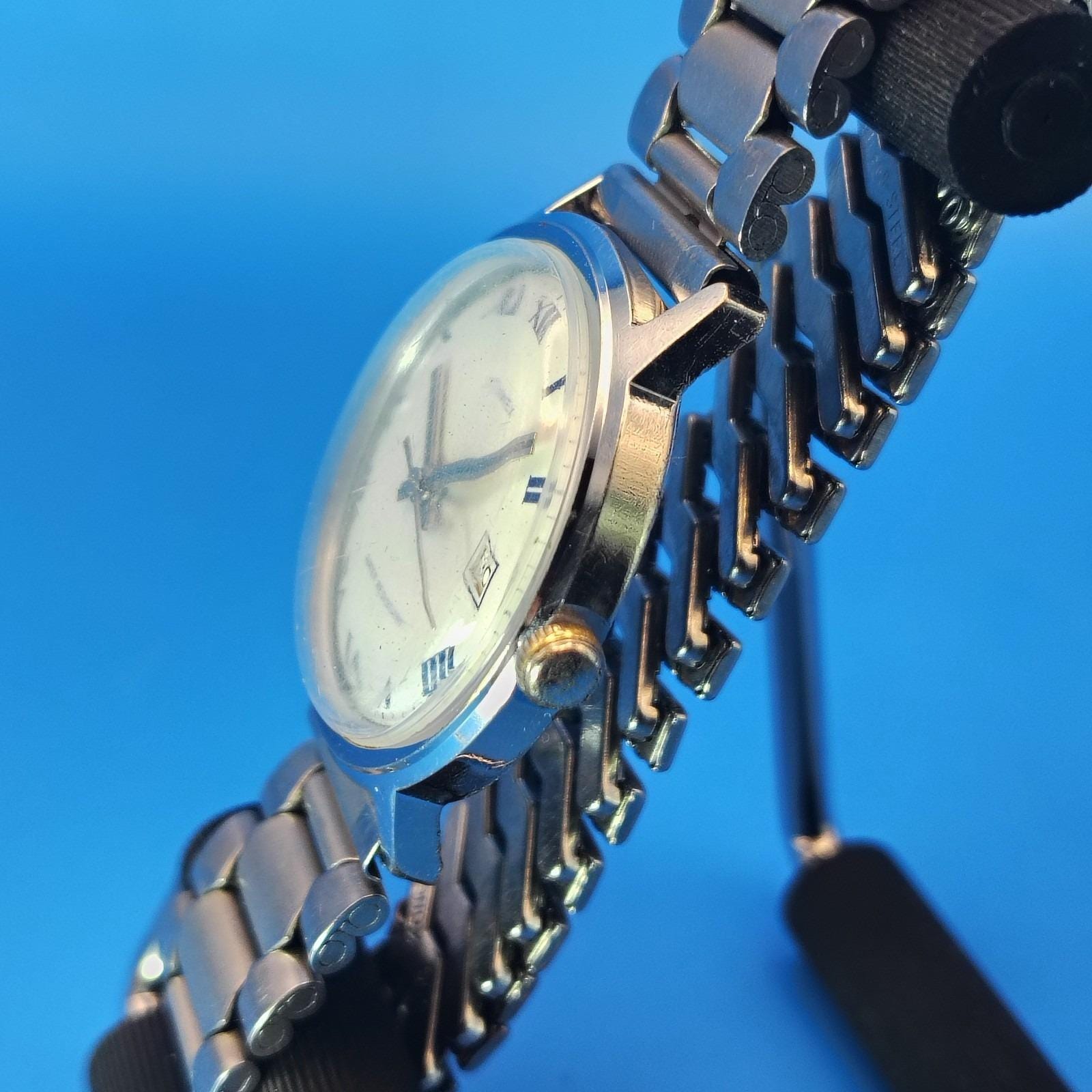 Vintage 1976 Timex Date Mechanical Wind 35mm Mens Watch  display picture 3
