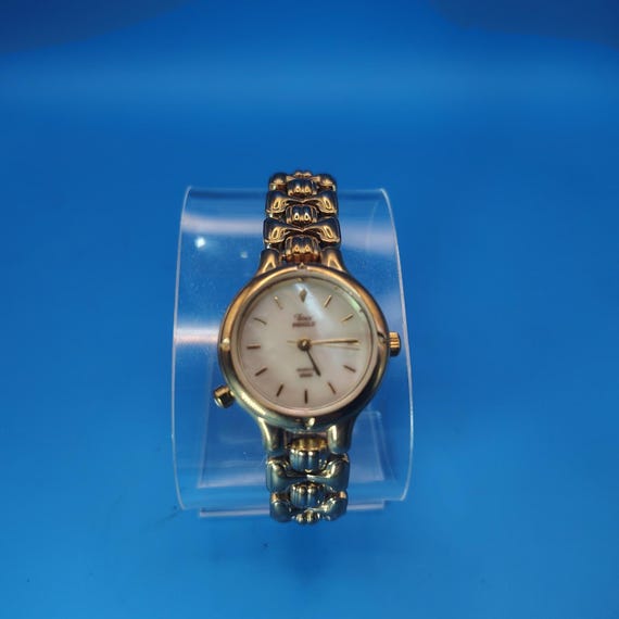 Vintage 1993 Timex Indiglo Mother of‎ Pearl  27mm Women\'s Quartz Watch Size 5.5 Vintage 1993 Timex Indiglo Mother of Pearl 27mm Women main image 4