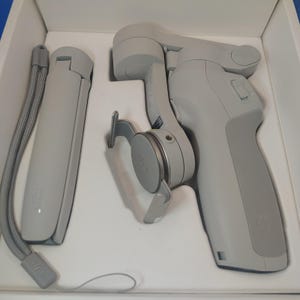 DJI OM 4 SmartPhone Gimble 3 Axis Stabilizer New Open Box Fully Tested