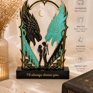 Fourth Wing inspired book stand and matching dragon bookmarks styled on a table showing the complete fantasy reader gift set.