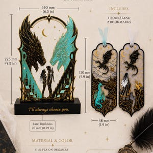 May include: A black and turquoise dragon-themed bookstand measuring 8.9 inches by 6.3 inches with a 0.79-inch base featuring the text 'I'll always choose you.' Includes two 5.9-inch by 1.9-inch bookmarks with dragon illustrations and ribbon accents.