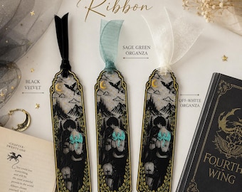 May include: Three rectangular bookmarks featuring a black lace overlay with a gold-toned mountain and dragon illustration. Each bookmark has a different ribbon: black velvet, sage green organza, and off-white organza. Text includes CHOOSE YOUR RIBBON.
