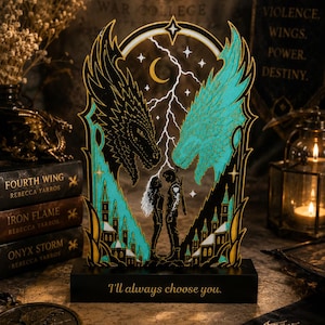 Fourth Wing inspired 3D printed book stand featuring black and turquoise dragons gold details and romantic couple design.