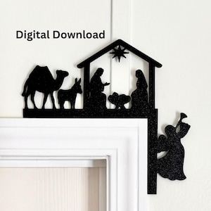 May include: Black silhouette Christmas nativity scene with a camel, donkey, and angel. The scene includes Mary, Joseph, and baby Jesus in a manger. The words "Digital Download" are in the upper left corner.
