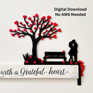 May include: A black tree with red heart-shaped leaves, a bench, and a couple silhouette. The phrase "with a Grateful heart" is written on a white sign with floral accents. The words "Digital Download No AMS Needed" are also visible.