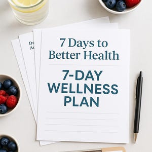 May include: A wellness plan titled "7 Days to Better Health" with text and lined spaces. The image includes a glass of water with lemon, bowls of blueberries and raspberries, a pen, and a clipboard with "Daily Action Steps".
