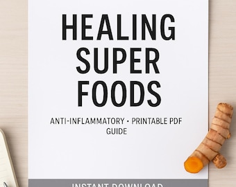 May include: A white paper with the title "HEALING SUPER FOODS" in bold black letters. Below the title are the words "ANTI-INFLAMMATORY • PRINTABLE PDF GUIDE" and "INSTANT DOWNLOAD". The image includes turmeric, sprouts, and glasses.