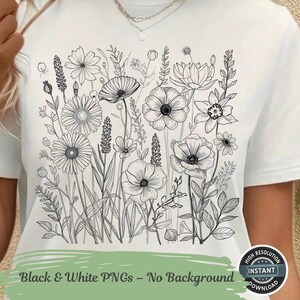 Pode incluir: Camiseta branca com uma ilustração floral detalhada em preto e branco. O design inclui várias flores e folhagens, criando um tema botânico. O texto "Black & White PNGs - No Background" está impresso na parte inferior.