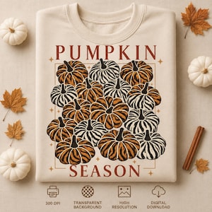 Pode incluir: Uma camisola de gola redonda bege com o texto PUMPKIN SEASON em letras vermelho-escuras. O gráfico apresenta um grupo de abóboras com vários padrões de animais, incluindo riscas de tigre e zebra, dispostas numa moldura retangular.