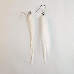 extra small thin white feather earrings dangler natural feathers