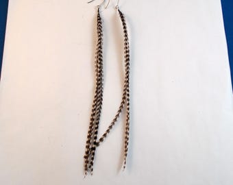 white tiger grizzly natural feather earrings medium length