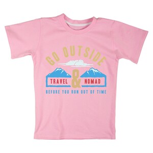 May include: A pink t-shirt with the words "GO OUTSIDE" in a light yellow font. Below the text are two blue mountain illustrations with the words "TRAVEL" and "NOMAD" in blue boxes. The text "BEFORE YOU RUN OUT OF TIME" is below the mountains.