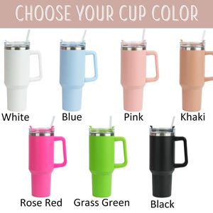 May include: A selection of insulated tumblers in various colors, each with a handle, lid, and straw. Colors include white, blue, pink, khaki, rose red, grass green, and black. The text "CHOOSE YOUR CUP COLOR" is at the top.