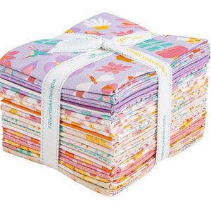 May include: A stack of colorful fabric squares tied with a white ribbon. The fabric features floral and hummingbird patterns in shades of purple, pink, yellow, and orange. The ribbon is printed with the text "create colorfully" and "#RileyBlakeDesigns".