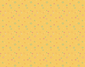 May include: A mustard yellow fabric featuring a repeating pattern of small, scattered floral motifs in shades of teal, pink, and white. The design consists of tiny, simple flower shapes and dots distributed evenly across the solid yellow background.