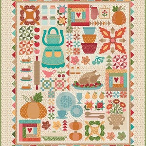 May include: A rectangular quilt featuring a patchwork design with various kitchen and autumn-themed motifs including an apron, a roasted turkey, pumpkins, bowls, pies, leaves, and flowers in shades of orange, red, blue, green, and cream with a border.