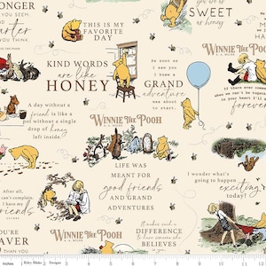 May include: Cream-colored fabric featuring Winnie the Pooh illustrations and quotes. The design includes Pooh Bear, Piglet, and other characters, along with phrases like "Kind words are like honey." The fabric has a whimsical, storybook feel.
