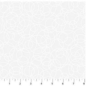 May include: White fabric with a repeating pattern of overlapping, free-form white circles. The circles vary in size and density, creating a textured appearance. The background is a light gray color. The fabric has a ruler along the bottom edge.