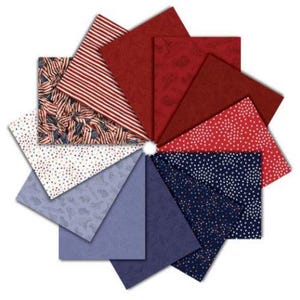 May include: A set of three ceramic mugs with a speckled, matte finish. The mugs are in shades of cream, light gray, and dark gray. Each mug has a simple, minimalist design, perfect for coffee or tea.