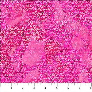 May include: Pink fabric with the word "love" repeated in a cursive script. The fabric has a watercolor effect with varying shades of pink and white. A ruler is at the bottom, showing measurements in inches.