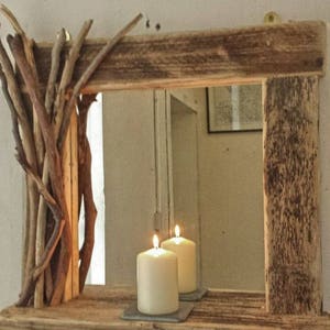 Rustic reclaimed wooden mirror with shelf and decorated frame