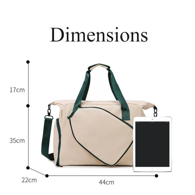 May include: Beige duffel bag with dark green accents. The bag has a shoulder strap and handles. Dimensions are 17cm high, 35cm wide, 22cm deep, and 44cm long. The word "Dimensions" is printed at the top.