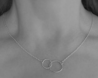 Sterling silver two circles necklace. Interlocking circle.