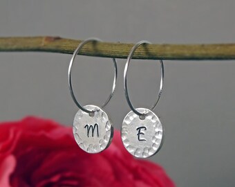 Sterling silver personalised initial disc hoop earrings.