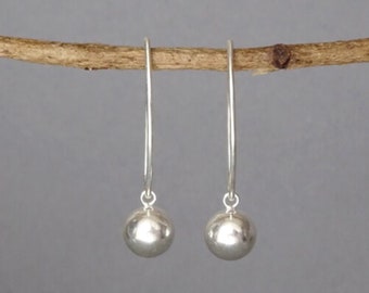 Ball sterling silver dangle earrings.