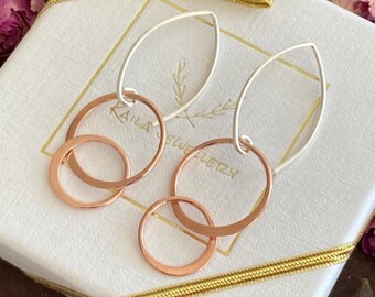 Sterling silver and 18k rose gold vermeil two circles earrings. Sterling silver dangle circle earrings.