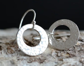 Hammered circle sterling silver earrings.