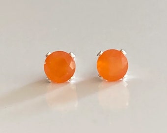 Faceted orange carnelian sterling silver stud earrings. 5mm round carnelian studs.