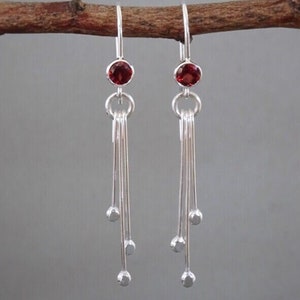 Garnet birthstone sterling silver dangle earrings.