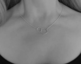 Sterling silver two circles necklace. Interlocking circle.