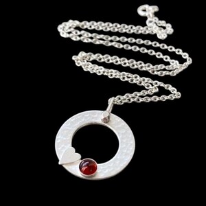 Handmade Sterling Silver Circle Necklace: Garnet Heart, Hammered Texture
