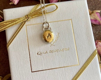 24k gold plated solid sterling silver initial, organic hand stamped pebble charm necklace. Personalised letter necklace.