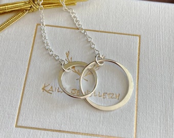 Sterling silver interlocking circle necklace. Infinity, unity necklace. Entwined circles. Double circle necklace.