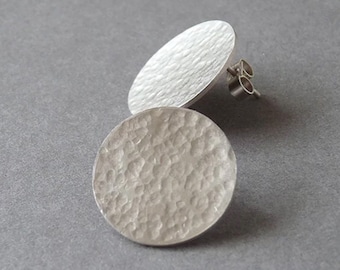 Minimalist sterling silver hammered disc stud earrings.