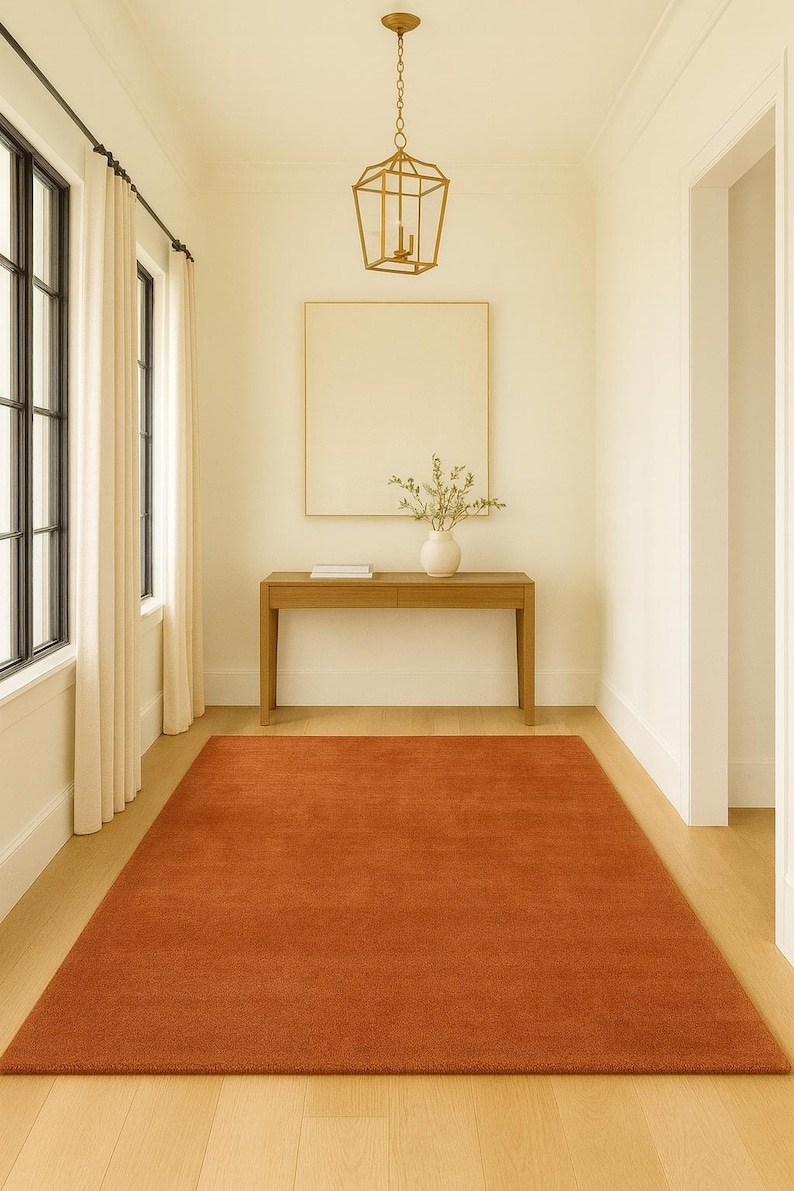 Scandinavian bedroom with warm earthy tone rug