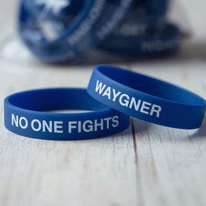 Custom Debossed Color-filled Silicone Wristbands: Personalized Event & Awareness Bands
