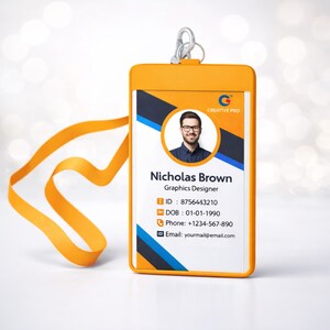 May include: A yellow plastic ID badge holder with a matching yellow lanyard and a metal clip. The badge features a circular portrait of a person, the text Creative Pro, the name Nicholas Brown, job title Graphics Designer, and ID details.