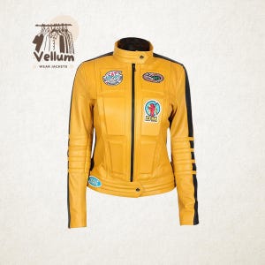 May include: Yellow leather jacket with black accents, a stand-up collar, and multiple patches. The jacket features a zip-up front, vertical seams, and black stripes down the sleeves. The jacket has the text "Vellum Wear Jackets" on the top left.