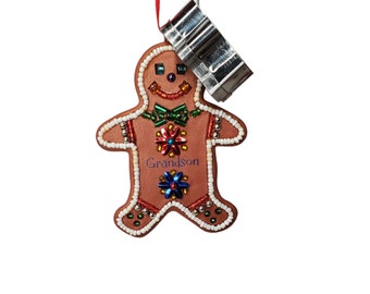 2003 Grandson Hallmark Keepsake Ornament, Gingerbread Man with a cookie cutter attached by string Christmas Ornament