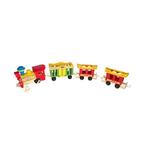 May include: A colorful toy train set with a red engine, yellow and green cars, and a blue smokestack. The train cars are connected by a string. The train set is made of wood and has black wheels.